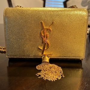 Aunentic gold ysl tassel bag